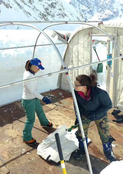 Setting up the basecamp tent